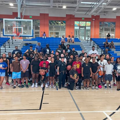 Players and officers at Unity at the Rim