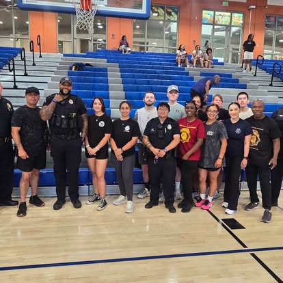Officers and young players together at Unity at the Rim